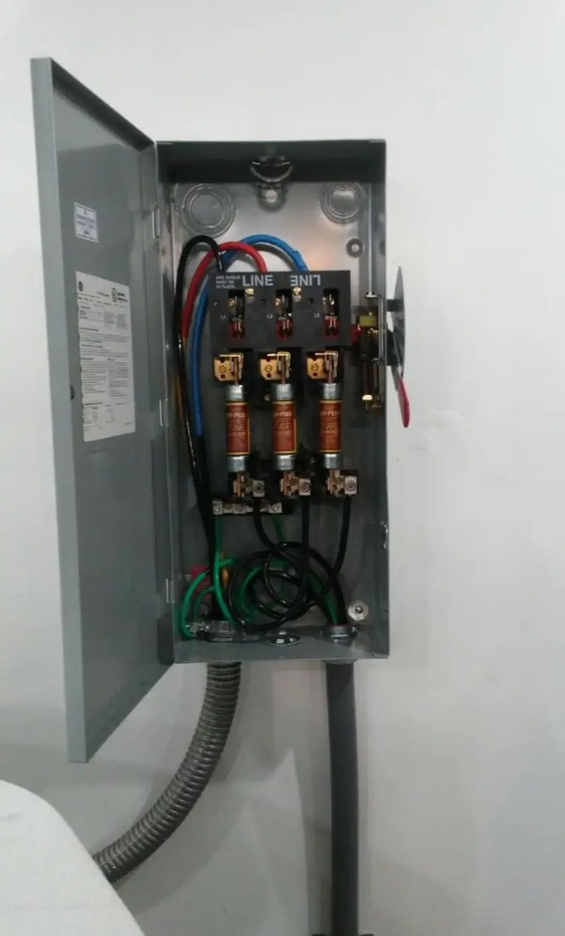 Three-phase disconnect switch installed for Smoke Detector Installation in Indialantic