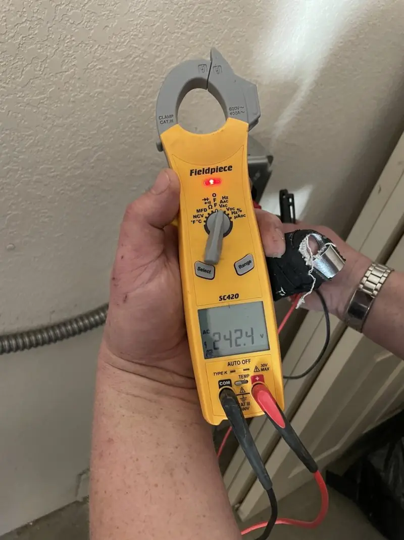 Voltage testing with clamp meter during Generator Installation in Indialantic